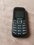 Samsung E1200,sve mreže,sa punjačem--baterija nova orginal