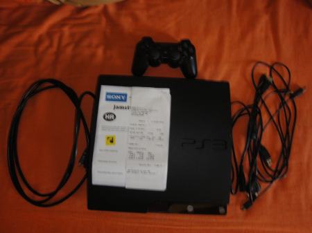 Prodajem ps3 250gb slim, Guitar hero, 8 igara
