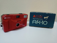 Akica AK-10 analogni fotoaparat, sa kutijom i uputstvima, upotrebljiv