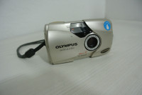 Fotoaparat Olympus StylusEpic upali se i skljoca,ali objektiv nece van