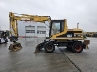 CAT M312D 1997g. NEISPRAVAN