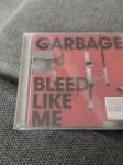 GARBAGE BLEED LIKE ME INCLUDES THE HIT SINGLE 'WHY DO YOU LOVE ME'