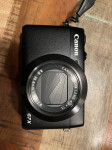 Canon G7x i Olympus E-500 sa opremom