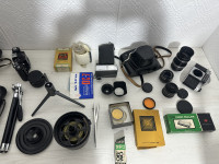 Fotoaparati Praktica sa 3 objektiva i Zenit sa objektivom, svi se mogu