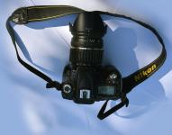Nikon d90 + tamron 17-50 f/2.8 + original Nikon battery grip.