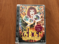 Glazbeni DVD-ovi 2 komada (Cher, Phil Collins)