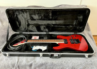Gitarski set (električna gitara, tvrdi kufer, …)