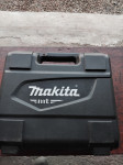 Električna bušilica Makita.