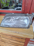 mazda 626 ,prednja lijeva lampa sa motorićem,2000god.