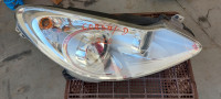 720-OPEL CORSA D PREDNJI DESNI FAR / LAMPA