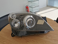 KSENON FAR OPEL ASTRA H DESNI