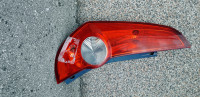 Opel Agila zadnja lijeva lampa - oštećena