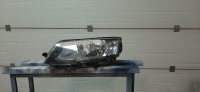 43-SKODA OCTAVIA/2013-2016/ PREDNJI LIJEVI FAR-LAMPA