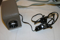 Stari portabl dijaprojektor Minolta