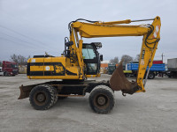 JCB JS 145W - Rubber wheel excavator