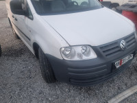 vw caddy vrata,branik,hauba,getriba,vezni lim,far,2004-2015,2.0 sdi