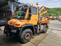 Unimog U400 2011. sa kranskim malčerom Mulag MHU800