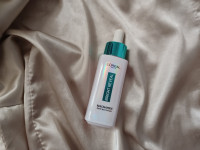 L’Oréal Paris Bright Reveal Serum SPF 50+ %