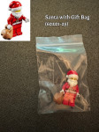 Lego minifigura Santa with Gift Bag (60201-25)