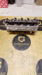Glava motora s bregastim vratilom 1.5 dCi Renault 110428257R
