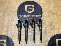 Injektorji Bmw N47D20C 0445110 478