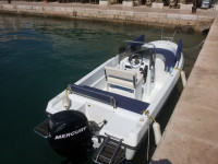 fisherman open solaria 18,mercury 60 hp