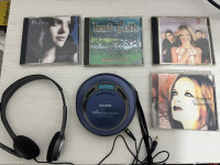 Discman Sony D-EJ621 sa nekoliko cd-a,potpuno ispravno,slusalice