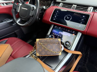 Ženska torba torbica Louis Vuitton koža