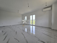 Buzet, 1S+DB stan u novogradnji, centar