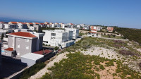 Građevinsko zemljište, Novalja, 1027 m2, blizu obilaznice
