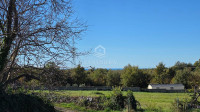 Istra, Divšići, zemljište 500 m2 sa projektom i građevinskom dozvolom