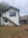 Kuća sa poslovnim prostorom i stanovima