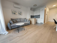 Moderno uređen stan u novogradnji - prvi najam; parking i spremište