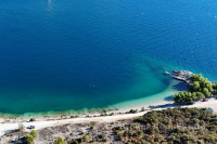 Obalna parcela s pogledom na Pelješki most