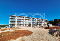 Poreč - dvosoban stan u modernoj zgradi koja spaja suvremenu arhitektu
