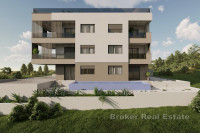 Prostrani trosobni penthouse s balkonom i lođom u novogradnji