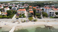 Samostalna stambena kuča sa jednim stanom,  4 apartmana te dodatnim gr