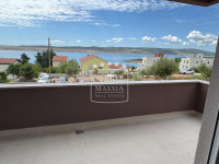 Seline - novogradnja ap. prizemlje sa pogledom na more i vrtom! 206000