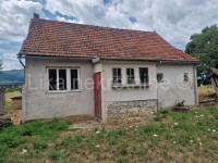 SINAC ( Otočac ) - kuća, pomoćna zgrada, voćnjak, okućnica 2661 m2