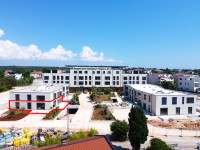 Stan u prizemlju sa zajedničkim bazenom u luksuznoj novogradnji