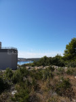 Trogir,Saldun,građevinsko zemljište 408m2,400m od mora i plaže,pogled