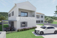 Veli Lošinj, NOVOGRADNJA, trosoban stan 88,80 m² s vrtom, terasom i pa