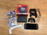 Nintendo switch 2 + 4 igre