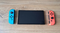 Nintendo SWITCH (OLED) Neon red/Neon-Blue sa priborom