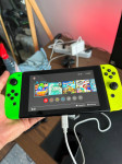 Nintendo Switch V1 komplet + dock + Zelda torbica + igre