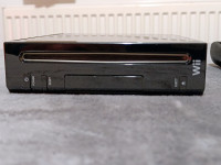 Wii Crni + modifikacija + 64GB USB stik sa 35 hit igara