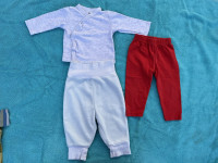Dvoje hlača i majica 62