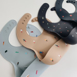 Mushie podbradnik Rocket