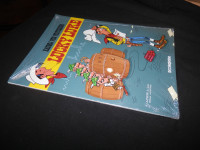 LUCKY LUKE 44 - KAUBOJ POD PRITISKOM BOOKGLOBE SC