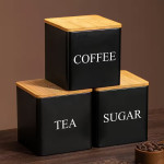 3 komada crno-bijelih metalnih posuda za pohranu